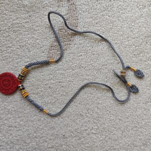 XSP011	Vermilion-Toned Vajra Eight Treasures Round Plaque
