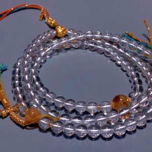 XSP049	Clear Quartz 108-Bead Mala, Golden Glow Edition