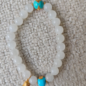 XSP042	Yellow Jambhala-Inspired Treasure Bell Bracelet